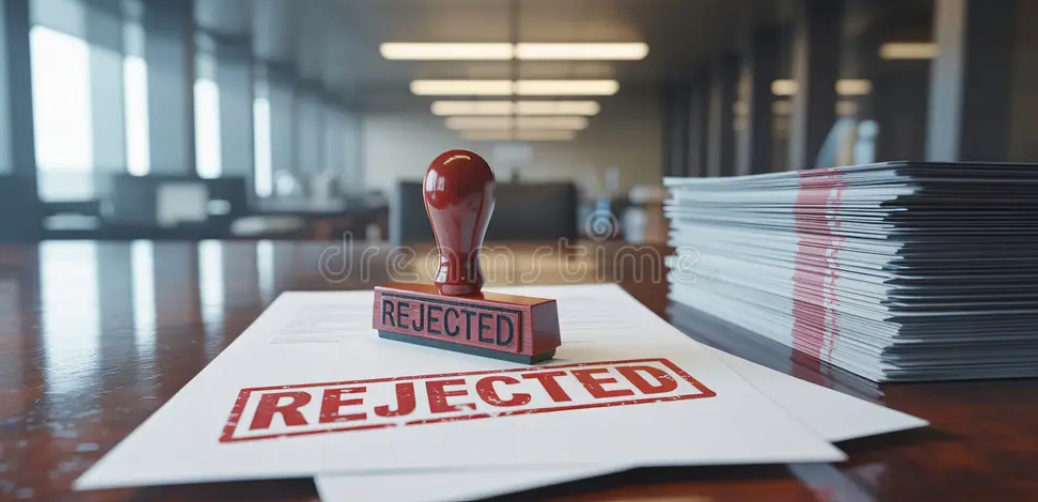 A document with a red rejected stamp.